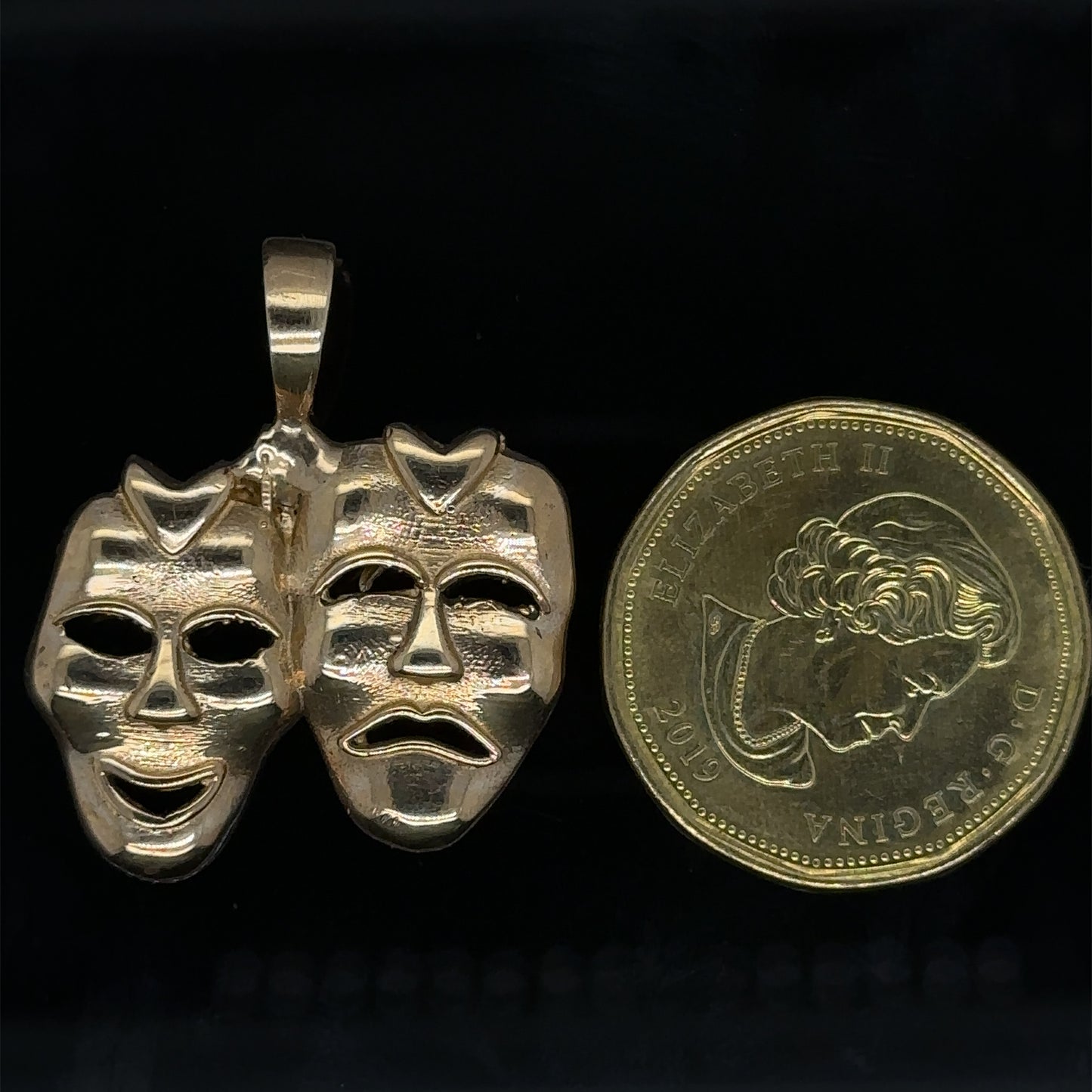 Two-Faced Gold Pendent